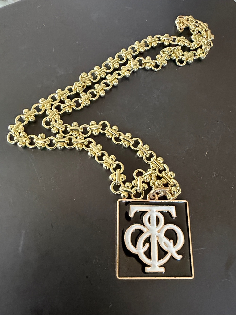 Gold Chain Necklace with Black & White Logo Pendant 20 inches